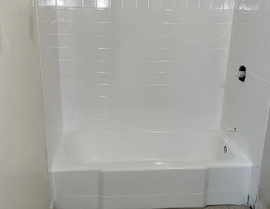 a white bathtub in a bathroom
